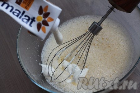 Добавить сливки и еще раз взбить.
