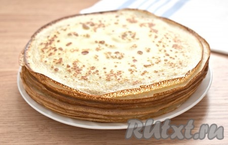 Вот такая аппетитная стопочка нежнейших блинчиков у меня получилась.