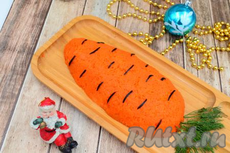 Вот какой яркий салат в виде морковки получился у нас. Перед подачей поставить его на час в холодильник для пропитки. Этот вкусный салат несомненно понравится и вам, и вашим близким. Ну а Лошадь - хозяйка наступающего Нового года - оценит ваши старания и принесёт вам и вашим близким здоровье, удачу и благополучие!