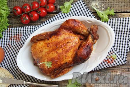 Курица целиком с чесноком в духовке