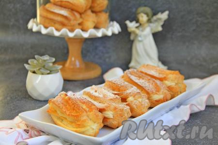 Эклеры с нежнейшим заварным кремом, приготовленные по этому простому рецепту, станут прекрасным дополнением к чаю или кофе. Вот так достаточно просто в домашних условиях можно приготовить замечательную выпечку для семейного чаепития или для праздничного стола!