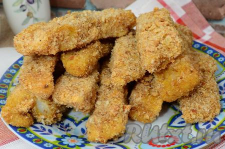 Пангасиуса в кляре запекать в разогретой до 180 градусов духовке примерно 20-25 минут.