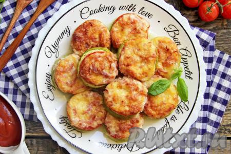 Кабачки с колбасой и сыром с помидорами в духовке