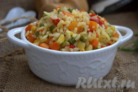 Вот такой рассыпчатый, аппетитный рис, приготовленный  с овощами на сковороде, у нас получился. Это яркое, аппетитное блюдо понравится многим!