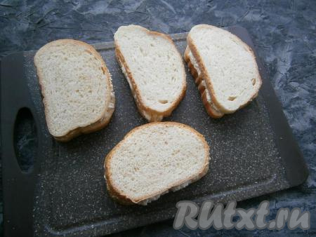 Накрыть эти ломти оставшимися 4 ломтиками, чуть придавив их.