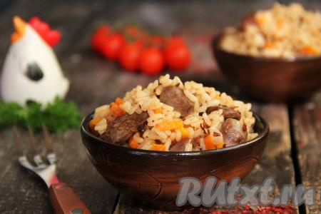Плов с куриными сердечками на сковороде