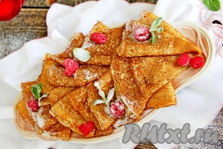 Ажурные, аппетитные, тонкие заварные блины, приготовленные на ряженке с добавлением кипятка, подать к столу.