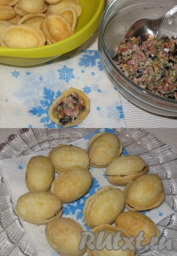 Скорлупки испеченных орешков заполнить начинкой и склеить попарно.
