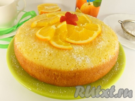 Дать соку впитаться, посыпать сверху сахарной пудрой и украсить апельсином, порезанным тонкими полукружочками.&nbsp;
