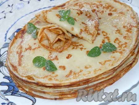 Посыпать аппетитные творожные блинчики сахарной пудрой и подавать к столу.
