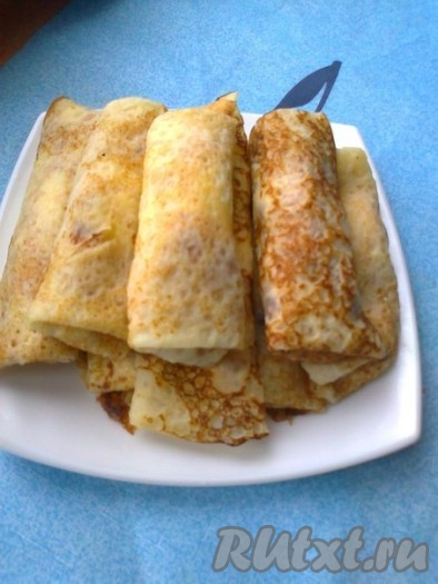 Тонкие, нежные блинчики, приготовленные из теста, замешанного на крахмале, подавайте со сметаной, вареньем или заверните в них начинку - в любом случае будет очень вкусно!